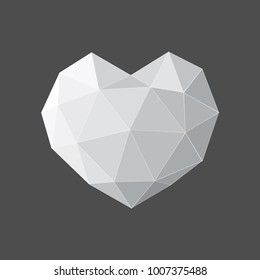Gray heart isolated on black background. Geometric rumpled triangular low poly origami style gradient graphic illustration. Vector polygonal design for your business.