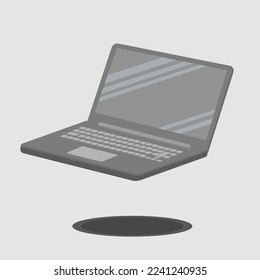 Grauer Laptop, der in der Luft schwebt.