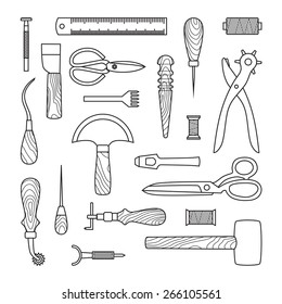 Gray Leather working tools on white background 