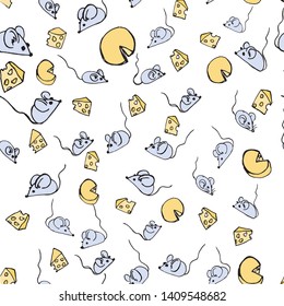 Gray mice with pieces of cheese