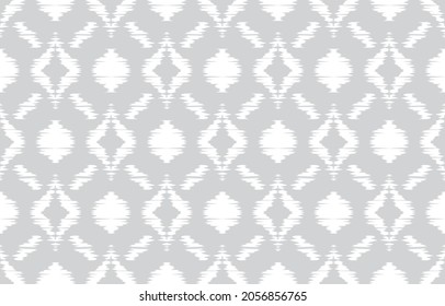 Gray ogee ethnic abstract background. Seamless in tribal, folk embroidery, native ikat fabric. rhombus geometric art ornament print. Design for carpet, wallpaper, wrapping, textile, decorative.