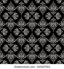 Gray ornament on a black background. Floral seamless pattern. Seamless background. Wallpaper baroque, damask.