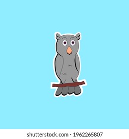 
gray owl on a branch