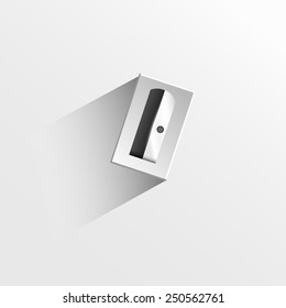 Gray pencil sharpener with long shadow