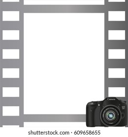 Gray photo frame with a camera in the bottom corner
