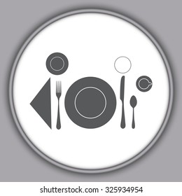 Gray plate with spoon, knife and fork