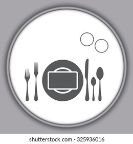 Gray plate with spoon, knife and fork 