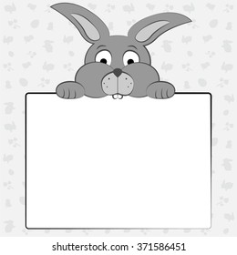 Gray rabbit holding a sheet of paper on gray background with symbols of Easter .