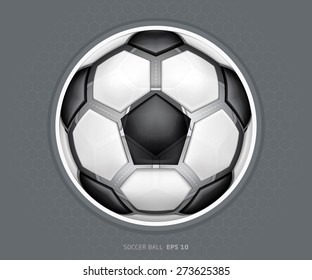 Gray realistic soccer ball on the floor