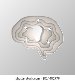 Gray silhouette of the brain carved on paper. Vector illustration