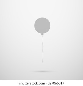 gray silhouette of the circle balloon on gray gradient background