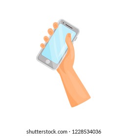 Gray smartphone in right human hand. Mobile phone with touch screen. Gadget for communication. Flat vector icon