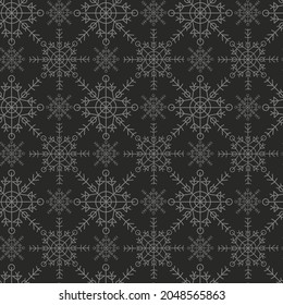 Gray snowflakes on a black background. Merry Christmas geometric seamless pattern. Primitive minimalistic snowflakes.