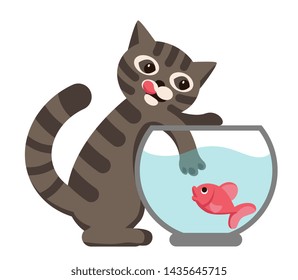 gray striped cat trying to get a fish from  aquarium