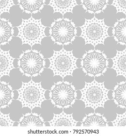 Gray and white floral ornament. Seamless pattern for textile and wallpapers