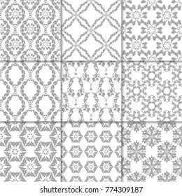 Gray and white floral ornaments. Collection of neutral seamless patterns for paper, textile