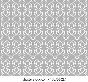 Gray and white seamless geometric line pattern. Contemporary graphic design. Endless hexagon texture for wallpaper, pattern fills, web page background. Tribal ethnic arabic indian ornament.