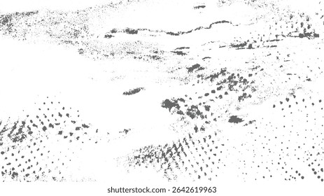 Textura cinzenta e branca com formas irregulares e densidade variável de manchas criando um efeito grunge. A composição apresenta uma mistura de elementos cinzas grandes e pequenos contra um fundo branco.