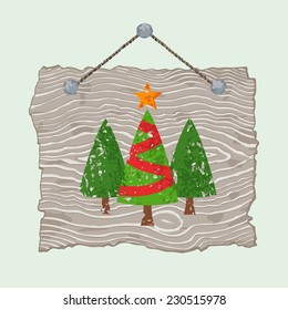 Gray wooden sign with painted Christmas trees for sale. 