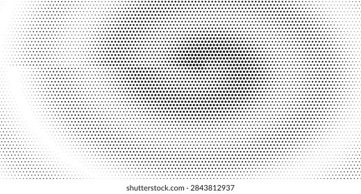 A grayscale abstract image featuring a halftone pattern with a central focus of denser dots forming a circular shape, surrounded by lighter, more dispersed dots.