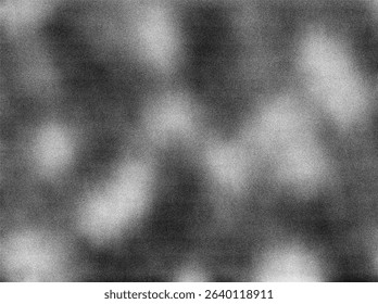 A grayscale image with a grainy texture, resembling a blurred or distorted photograph. It features abstract patterns of light and shadow, creating a subtle sense of movement or depth.