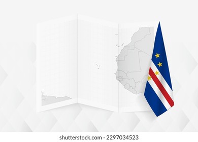 A grayscale map of Cape Verde with a hanging Cape Verde flag on one side. Vector map for many types of news. Vector illustration.