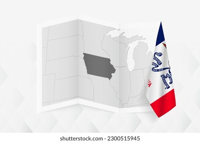 A grayscale map of Iowa with a hanging Iowa flag on one side. Vector map for many types of news. Vector illustration.