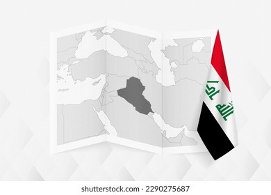 A grayscale map of Iraq with a hanging Iraqi flag on one side. Vector map for many types of news. Vector illustration.