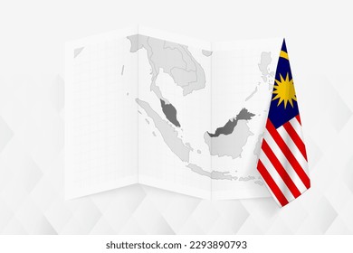 A grayscale map of Malaysia with a hanging Malaysian flag on one side. Vector map for many types of news. Vector illustration.