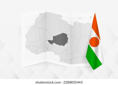 A grayscale map of Niger with a hanging Nigerien flag on one side. Vector map for many types of news. Vector illustration.