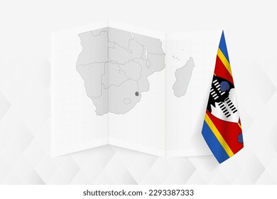 A grayscale map of Swaziland with a hanging Swazi flag on one side. Vector map for many types of news. Vector illustration.