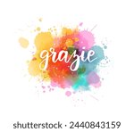 Grazie - Thank you in Italian. Handwritten modern calligraphy watercolor lettering text. Colorful handlettering on watercolor paint splash