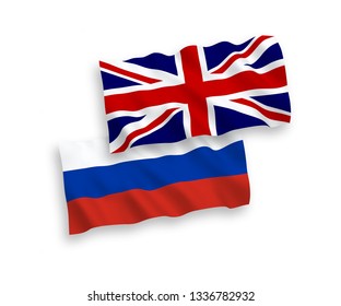 Great Britain and Russian flags isolated on white background. Vector illustration of the United Kingdom und Russia waving flags 1 to 2 proportion.