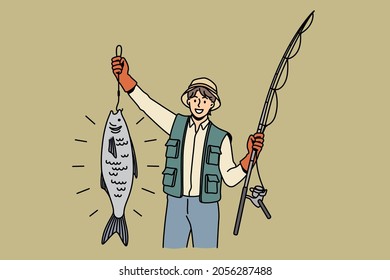 Great catch during fishing concept. Young smiling man cartoon character standing holding huge fish during fishing feeling lucky positive vector illustration 