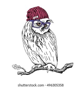 Great Horned Owl in a Knitted hipster hat and in a glasses on a oak branch. Vector illustration.