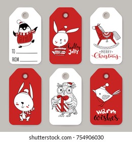 Great set of six vector holiday Christmas tags with cartoon characters rabbit, penguin, owl, wood horse and bird and holiday calligraphy. 