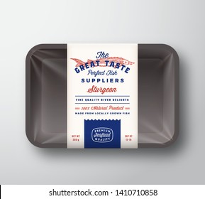 Great Taste Fish Suppliers Abstract Vector Rustic Packaging Design Label on Plastic Tray with Cellophane Cover. Retro Typography and Hand Drawn Sturgeon Silhouette Vintage Background Layout. Isolated.