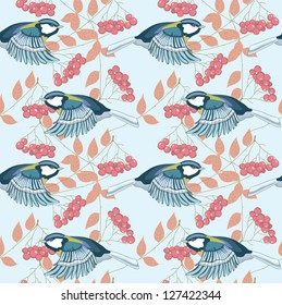 Great tit and cluster of red ashberry