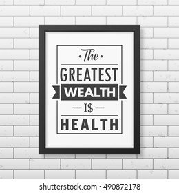 The greatest wealth is health - Typographical Poster in the realistic square black frame isolated on white background. Vector EPS10 illustration.