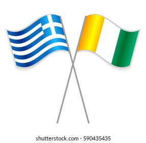 Greek and Ivorian crossed flags. Greece combined with Ivory Coast isolated on white. Language learning, international business or travel concept.