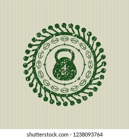Green 4kg kettlebell icon inside distressed rubber texture
