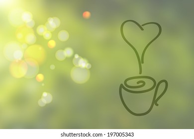 Green abstract blurred background with hand-drawing cup and heart