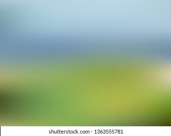 Green abstract blurred gradient mesh background.