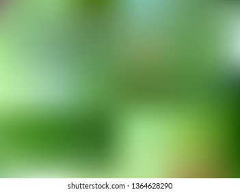 Green abstract blurred gradient mesh background.