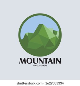 Green abstract geometric triangle mountain logo