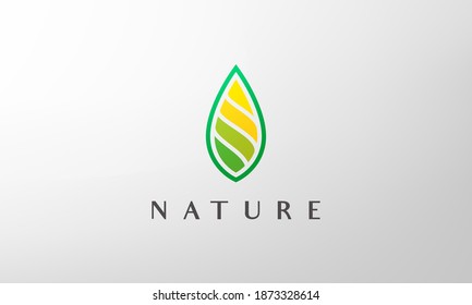 green abstract leaf logo in simple and modern style
