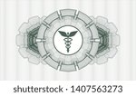 Green abstract linear rosette with Caduceus medical icon inside