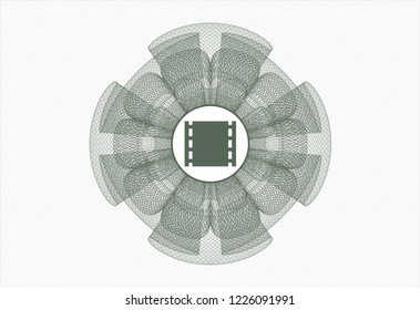 Green abstract linear rosette with film icon inside
