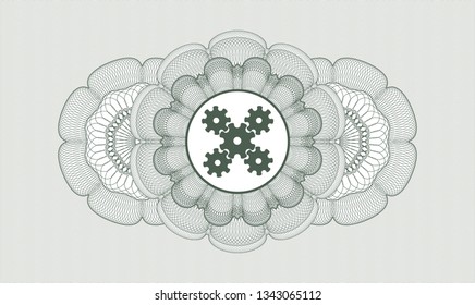 Green abstract linear rosette with mechanism icon inside