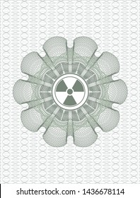 Green abstract linear rosette with nuclear, radioactive icon inside